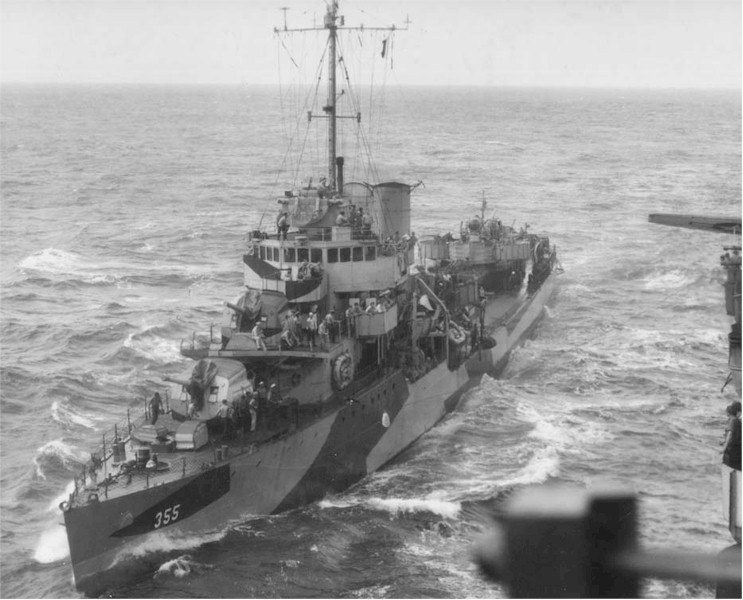 Aylwin in camouflage with hull number 355 on the bow