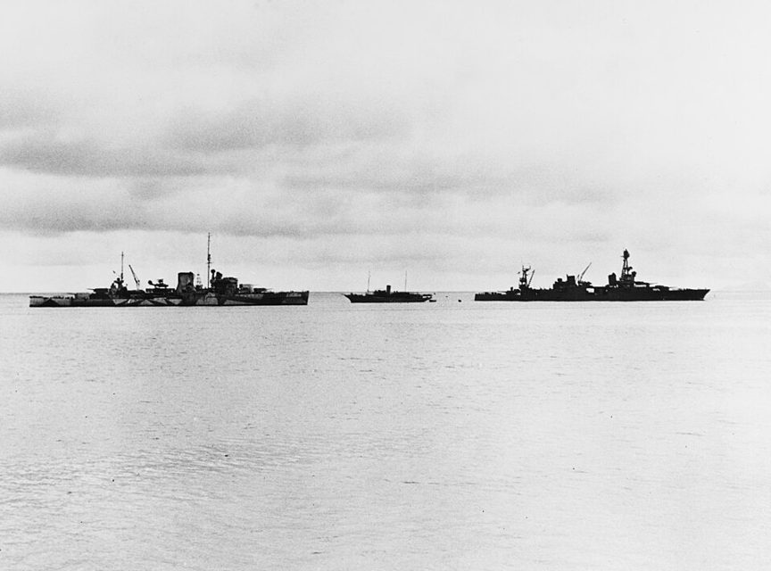 Chicago at anchor off Suva in February 1942, one of three distant ships