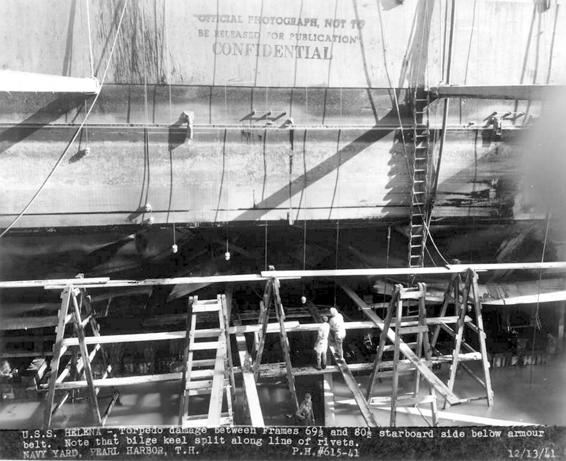 Helena's starboard side in dry dock, torn open below the armor belt